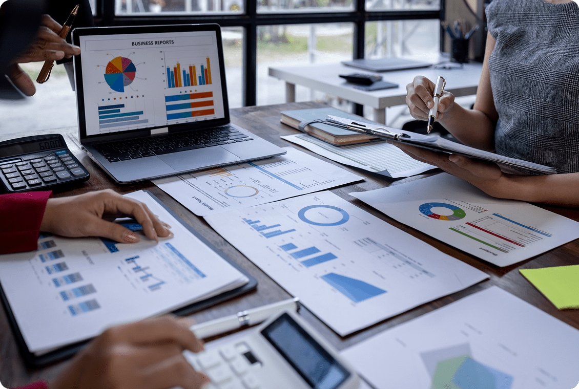 Business team analyzing financial charts