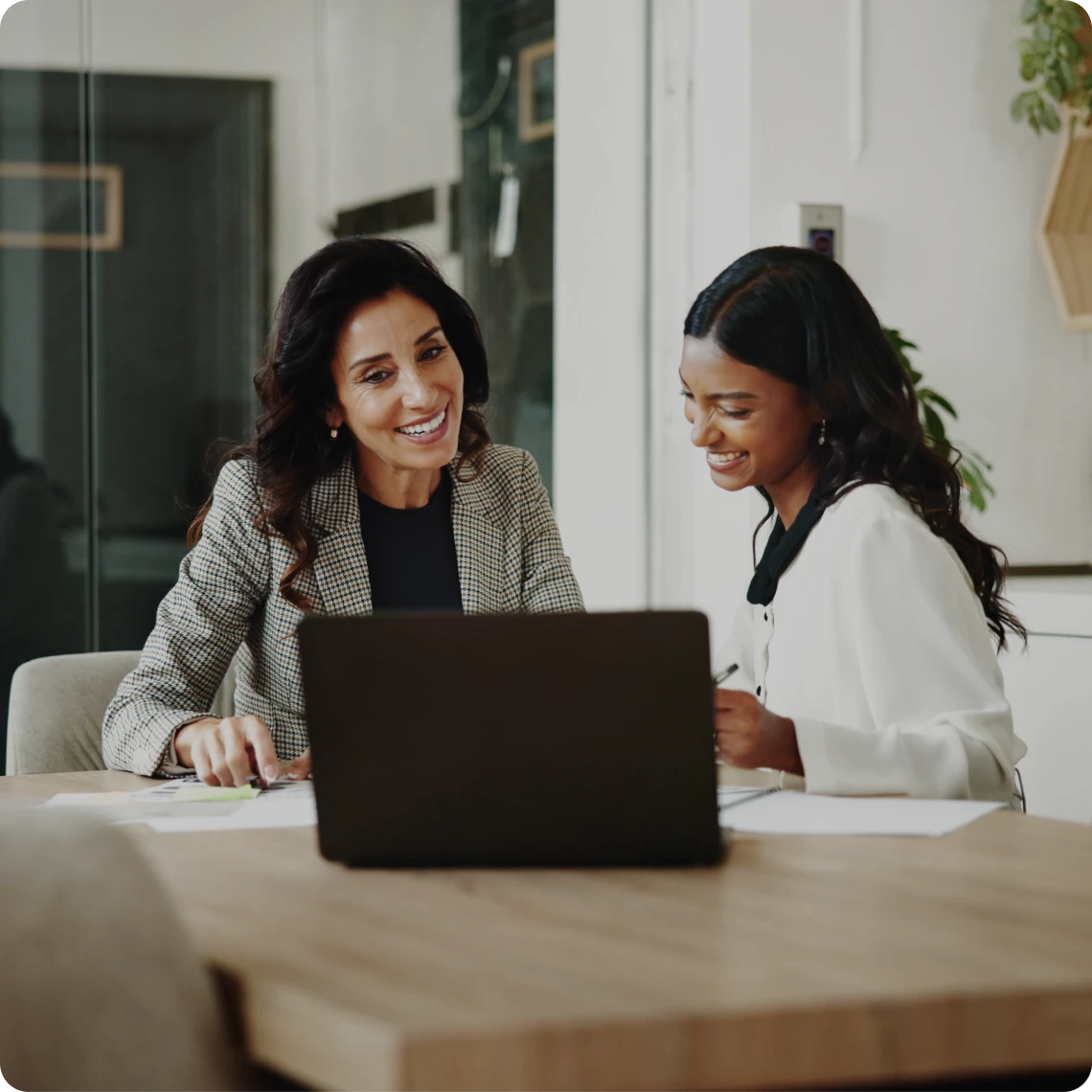 Two women collaborating in an office